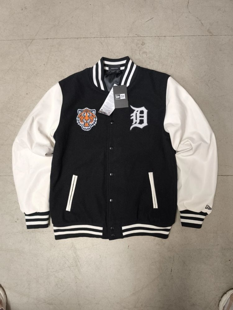 New Era varsity jacket with tiger patch and D logo